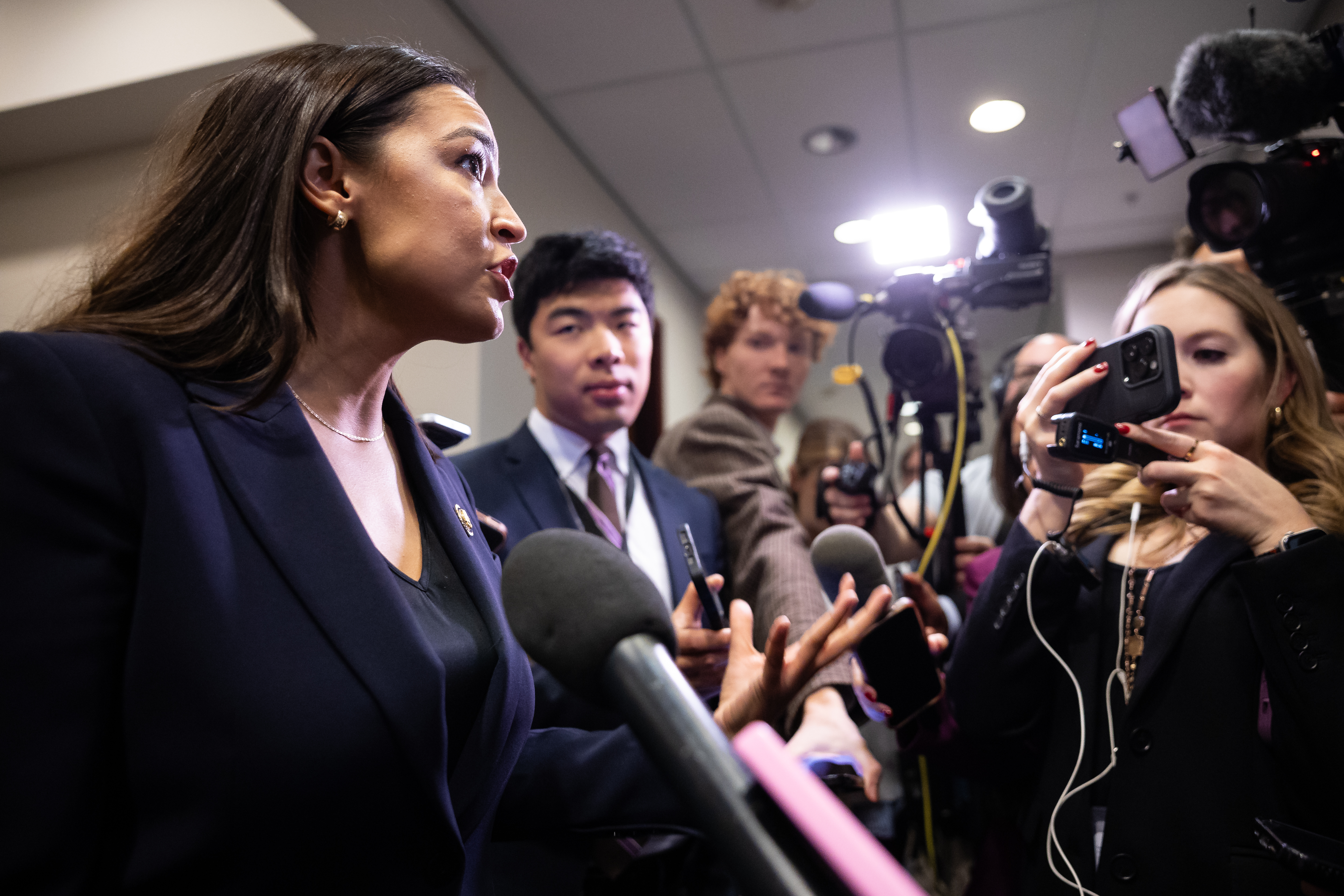 AOC Calls for 'Line in Sand' After Fatal ICE Shooting